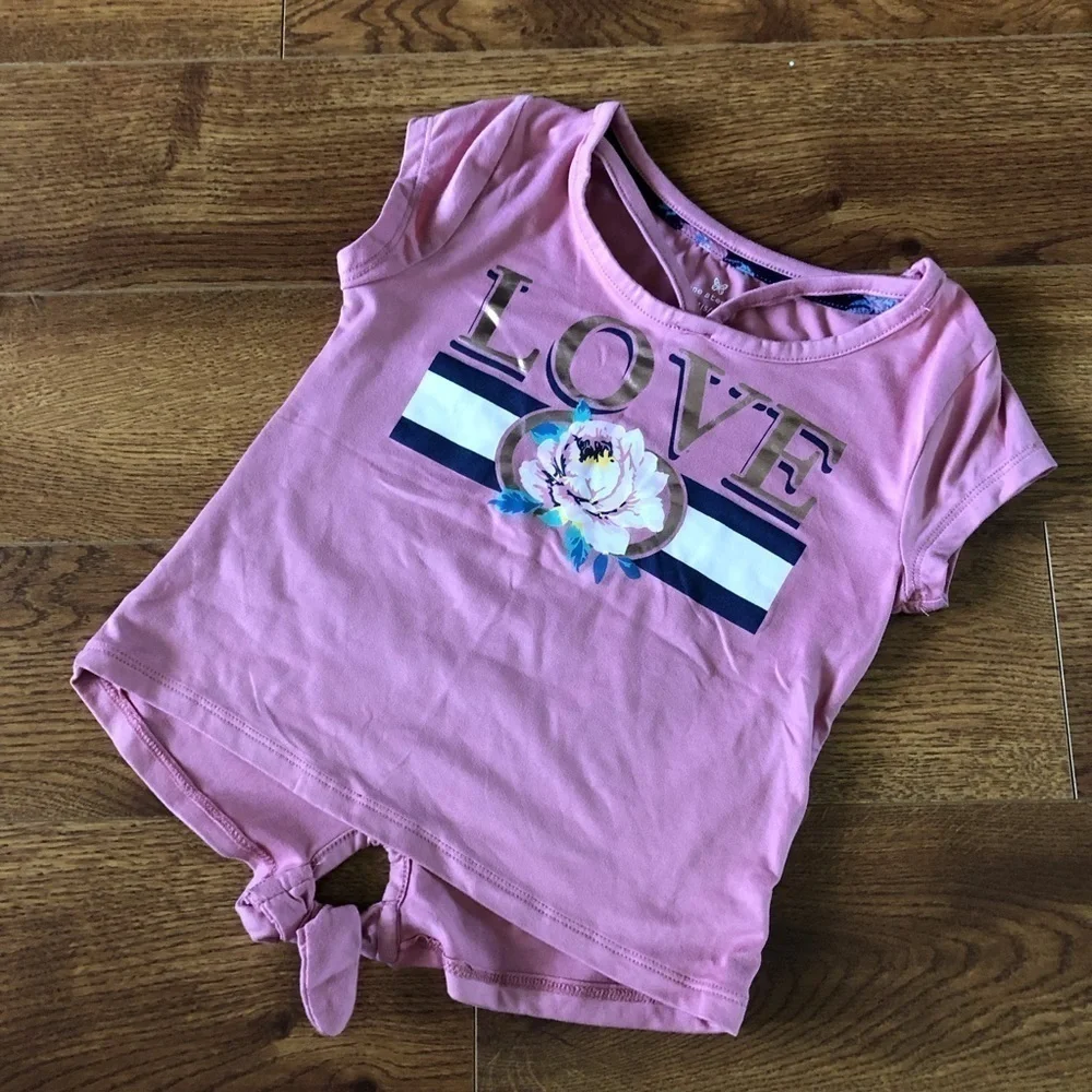 One Step Up pink love graphic tee in size M (5-6)